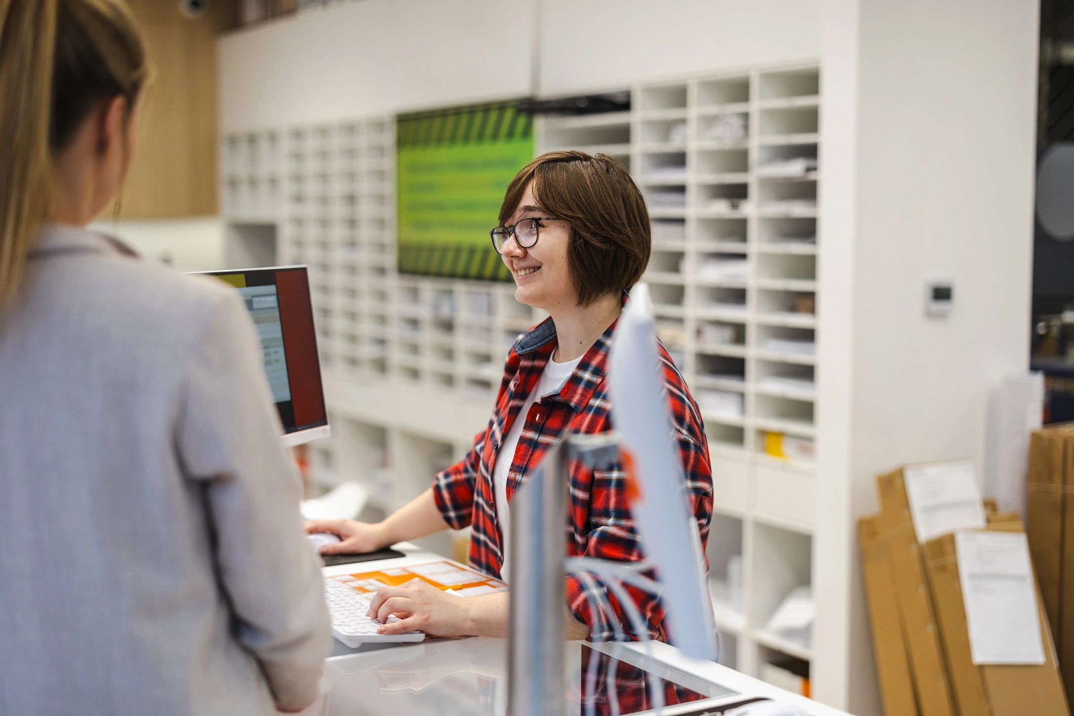 Customer service counter interaction at an office
