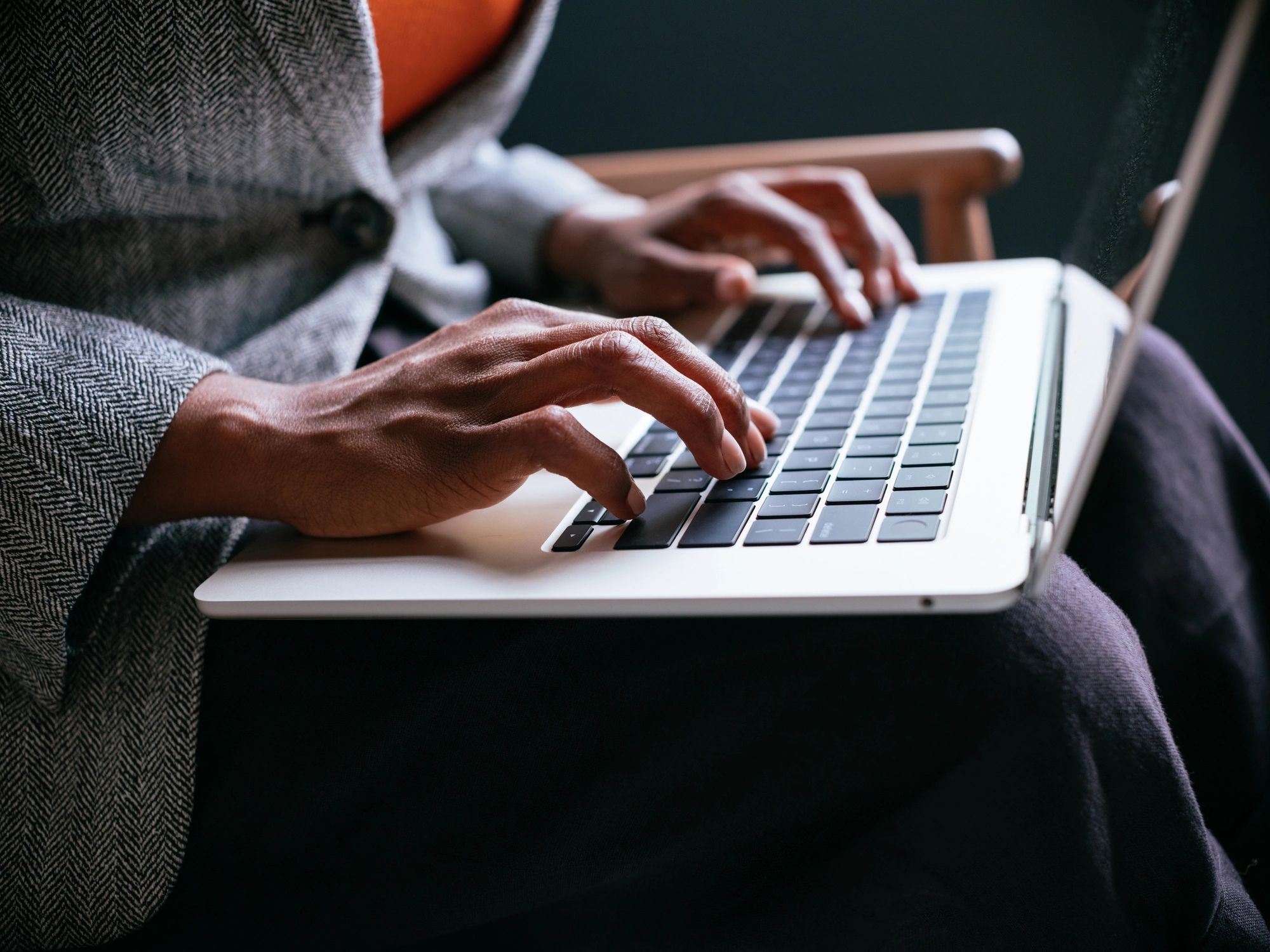 Resident using a laptop to access online services