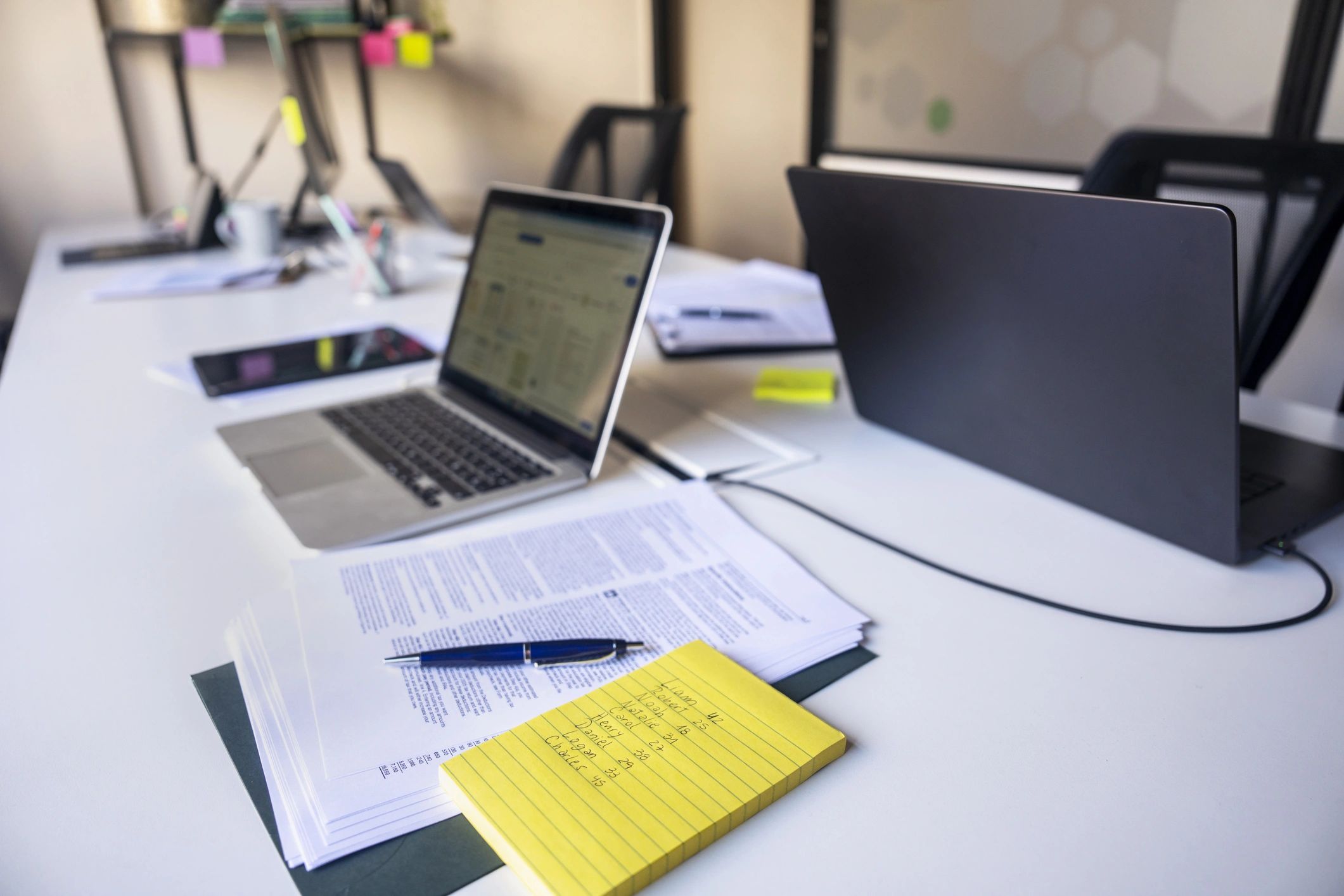 Office desk with sticky notes and stationery