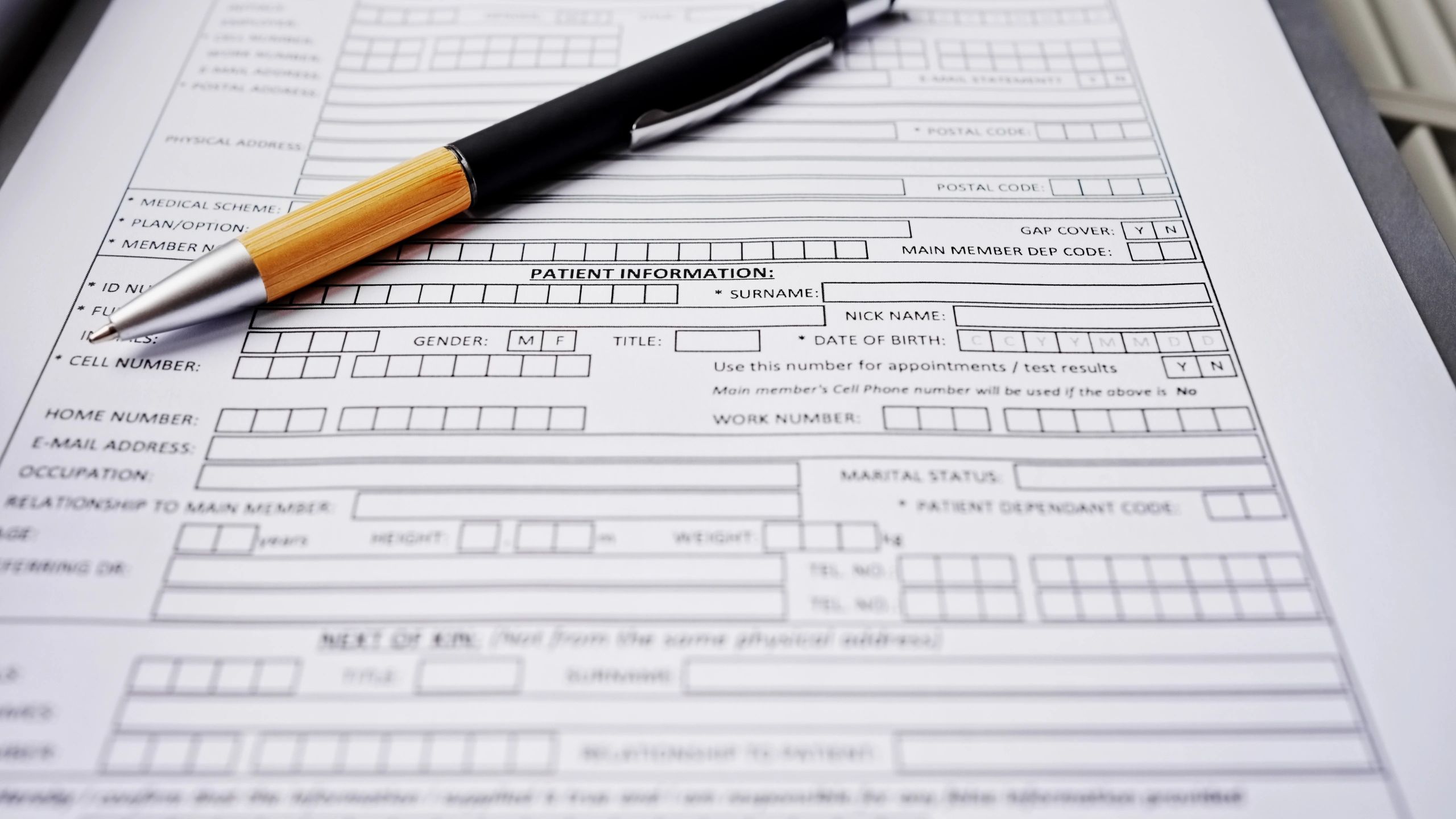 Form on a desk with a pen